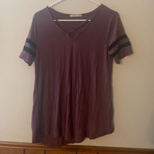 Purple shirt with criss cross on chest